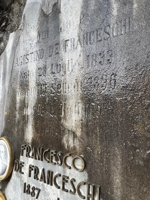 An older stone, and the name cut deep