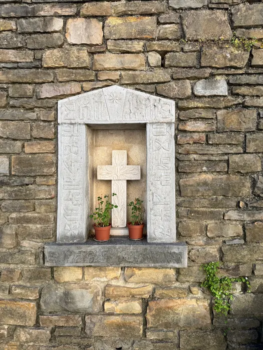 A niche in the cemetery wall